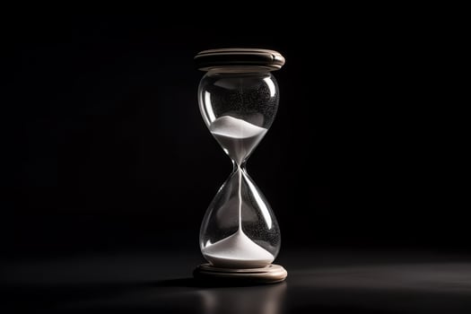 White isolated hourglass. photo