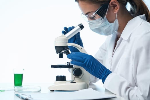 female doctor laboratory research microscope biotechnology professional photo