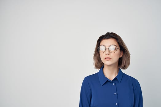 woman in blue shirt fashion posing elegant style photo