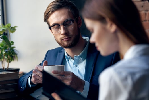business man and woman sitting in cafe socializing breakfast lifestyle photo