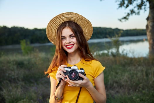 woman photographer red lips camera nature summer hobby photo