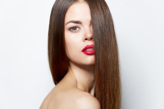 Woman with long hairstyle beautiful eyes spa treatments photo