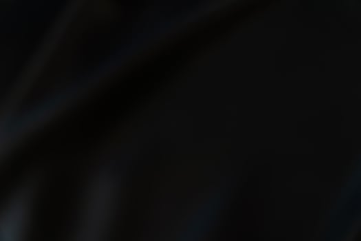 Black abstract background design. Black luxury fabric background with copy space. photo