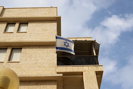 The blue and white flag of Israel with the six-pointed Star of David. photo