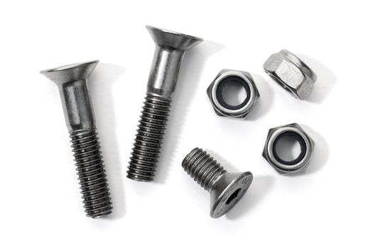 Flat head metric allen bolts and nuts isolated on white background photo