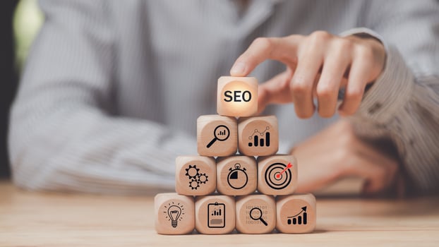 Marketer showing SEO concept,optimization analysis tools, search engine rankings, social media sites based on results analysis data,Website Search Optimization ,Interesting web rankings from visitors photo
