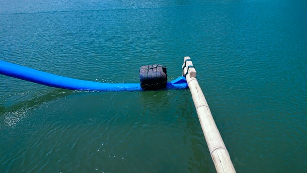 the side of a small ship at sea photo