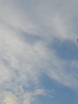White clouds on the blue sky perfect for the background photo
