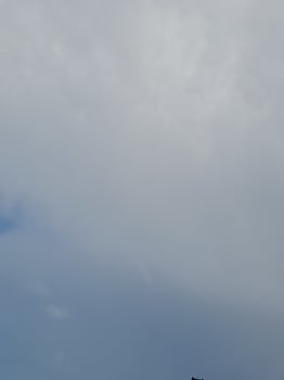 White clouds on the blue sky perfect for the background photo