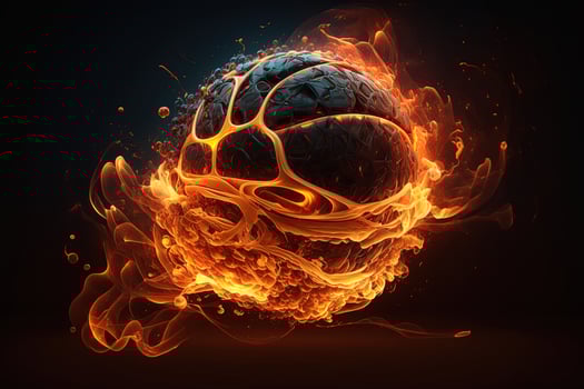 of a Glowing Ball Burning on Fire in Orange Flames, Giving off Heat and Smoke for Competitive Basketball A Visual representation of the Madness and Excitement of the Game photo