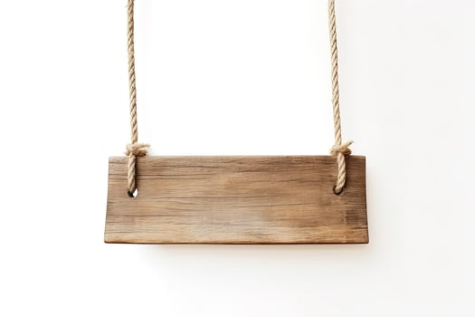 Wooden sign plain hanging from rope isolated on white background. photo