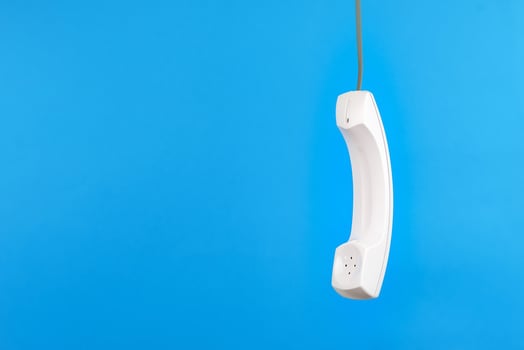 White telephone receiver with copy space photo