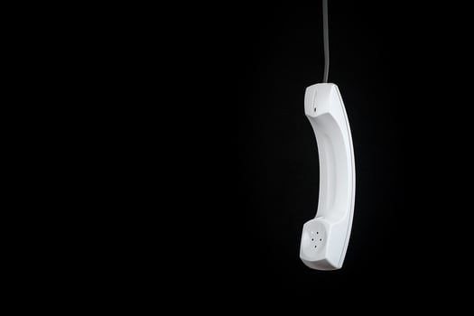 White telephone receiver with copy space photo