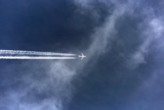 the plane is flying through the sky photo