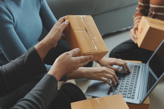 Business woman start up small business entrepreneur SME success .freelance woman working at home with Online Parcel delivery. SME and packaging deliveryconcept photo