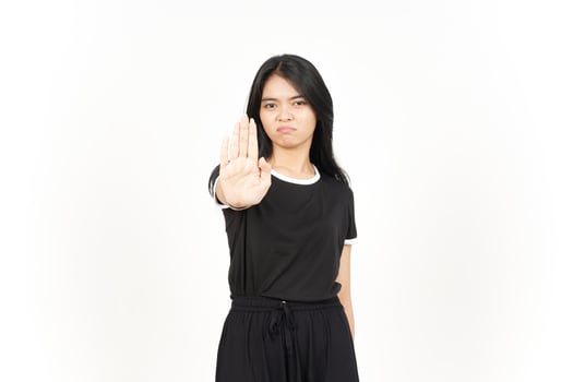 STOP Rejection hand Gesture Of Beautiful Asian Woman Isolated On White Background photo