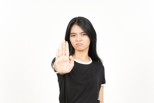 STOP Rejection hand Gesture Of Beautiful Asian Woman Isolated On White Background photo