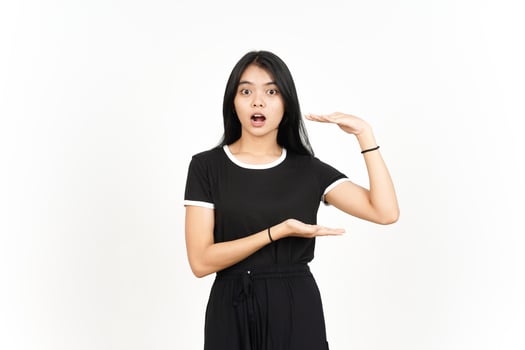 Measuring and Showing Big Sign Product Of Beautiful Asian Woman Isolated On White Background photo