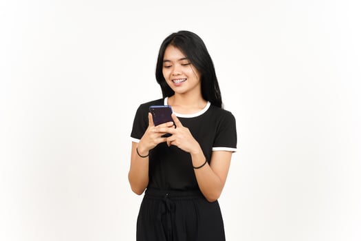 Holding or Using Smartphone and Smile Of Beautiful Asian Woman Isolated On White Background photo