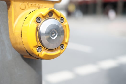 close up of crossing signal button in singapore photo