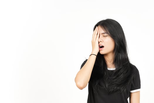 Suffering Headache Gesture Of Beautiful Asian Woman Isolated On White Background photo