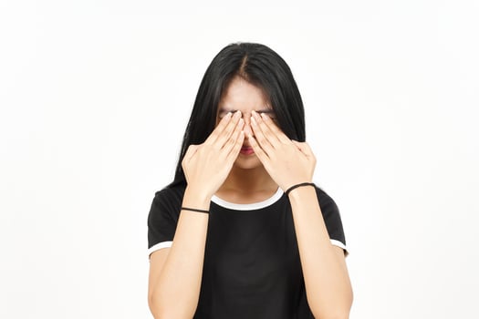 Covering Eye using hand Of Beautiful Asian Woman Isolated On White Background photo