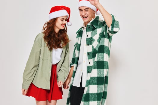 young couple wearing new year clothes fashion holiday studio together photo