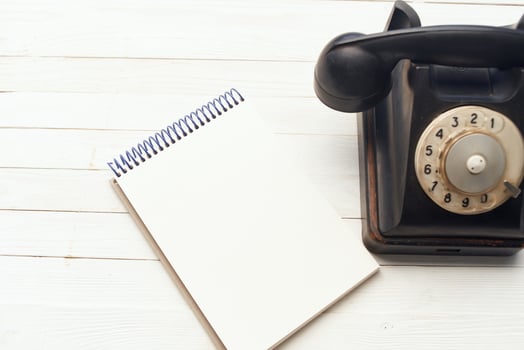 retro telephone he communication office notepad wooden background object photo