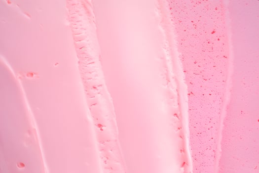 Strawberry ice cream close-up, smooth surface, texture, background. photo
