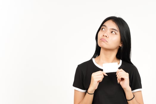 Holding Blank Bank Card Or Credit Card Of Beautiful Asian Woman Isolated On White Background photo
