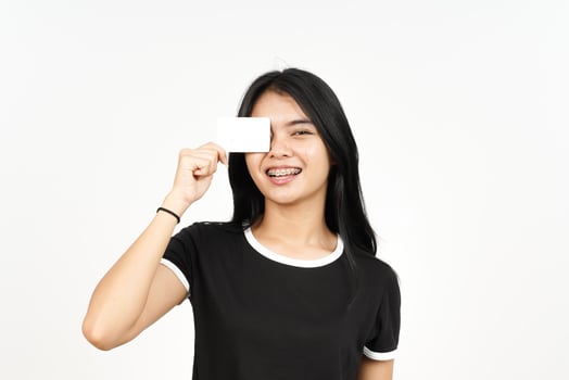 Holding Blank Bank Card Or Credit Card Of Beautiful Asian Woman Isolated On White Background photo