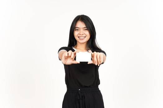 Holding Blank Bank Card Or Credit Card Of Beautiful Asian Woman Isolated On White Background photo