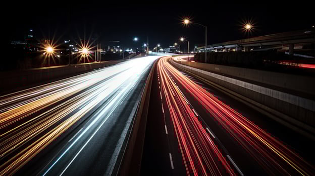 Traffic on an Highway Over pass or fly-over with motionblurred head lights, photo