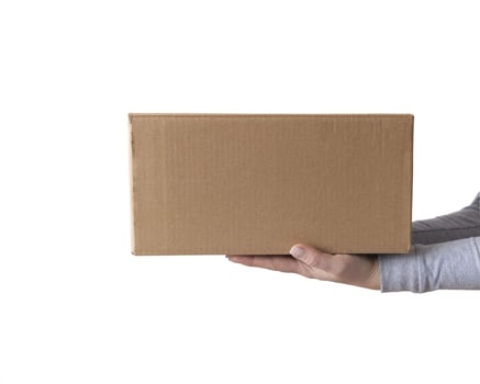 Delivery cardboard boxes in woman hand isolated photo
