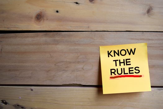 Know the Rules text on sticky notes with wooden background photo
