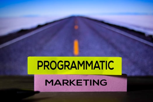 Programmatic Marketing on the sticky notes with bokeh background photo