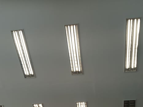 Neon lights that illuminate the room of an office. photo