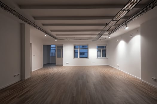 Empty room with white walls and lights in ceiling. photo