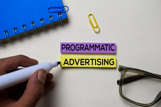 Programmatic Advertising text on sticky notes isolated on office desk photo