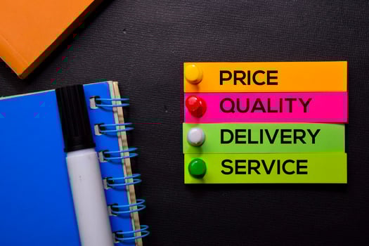 Price, Quality, Delivery, Service text on sticky notes isolated on Black desk. Mechanism Strategy Concept photo