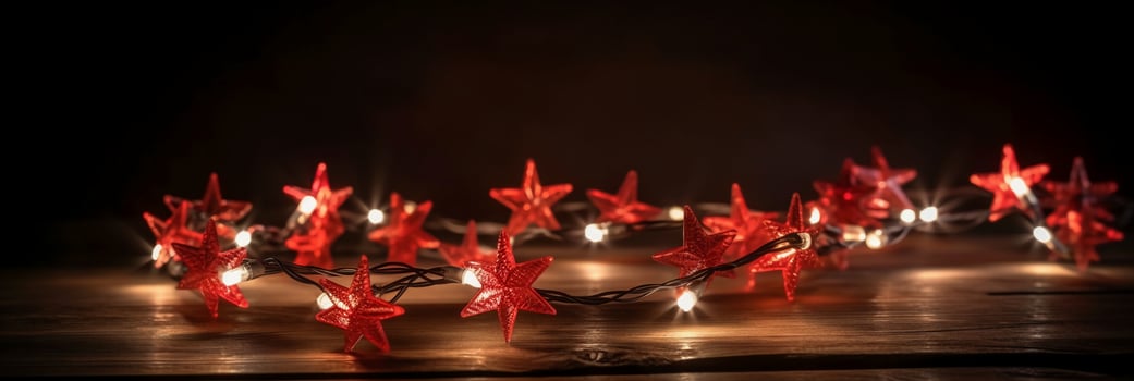 Christmas background with blue light luminous garlands and red stars on a white wooden background with copy space. photo