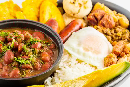 Traditional Colombian dish called Banda paisa a plate typical of Medellin that includes meat, beans, egg and plantain photo