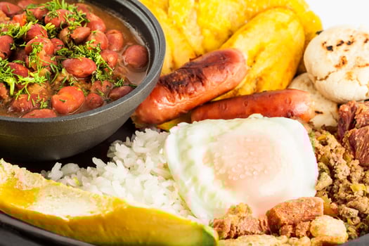 Traditional Colombian dish called Banda paisa a plate typical of Medellin that includes meat, beans, egg and plantain photo
