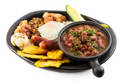 Traditional Colombian dish called Banda paisa a plate typical of Medellin that includes meat, beans, egg and plantain photo