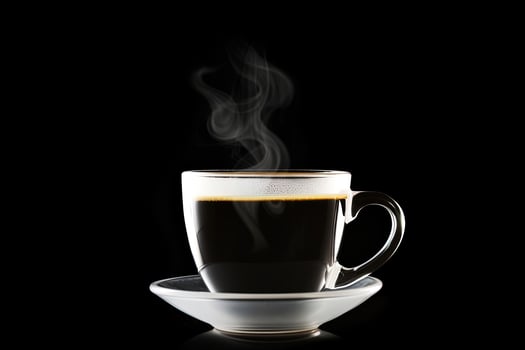 Close up a cup of a black hot coffee with smoke on black background. photo