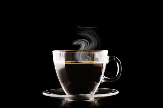 Close up a cup of a black hot coffee with smoke on black background. photo