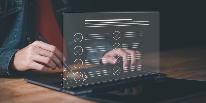 operator makes mark on the survey topic ,checkbox to conduct opinion and quality surveys or satisfaction , quality inspection ,checklist ideas ,answering questionnaires ,Online Assessment photo