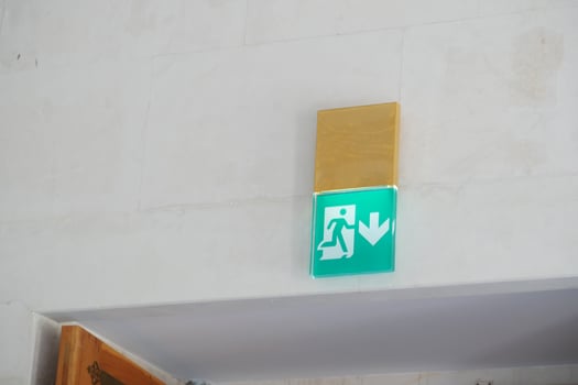 emergency exit door at super market , photo