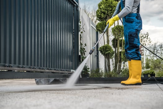 Man Washing the Driveway photo