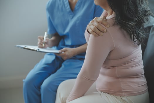 Male patient having consultation with doctor or psychiatrist who working on diagnostic examination on men's health disease or mental illness in medical clinic or hospital mental health service center photo